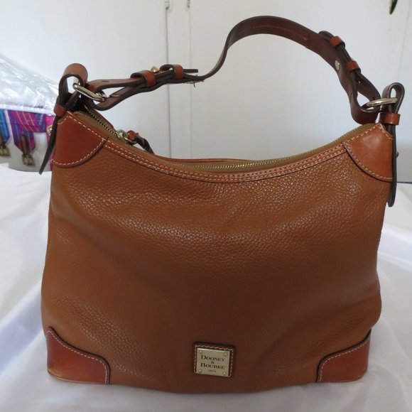 Dooney & Bourke Handbags - Dooney & Bourke Brown purse with Brown trim